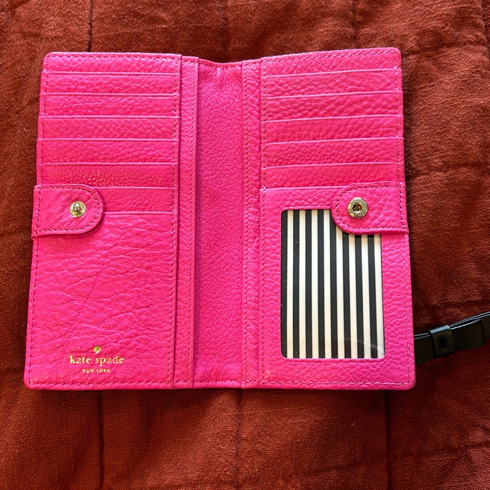 NEW hot pink Kate Spade wallet. slight markings on front priced accordingly